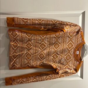 Kari Traa Orange and White Crewneck Base layer with Geometric Pattern
